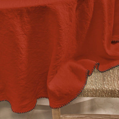 Nappe en lin ronde sur mesure avec point de cheval corail