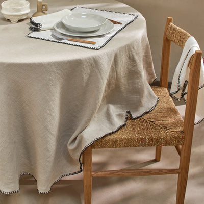 Nappe sur mesure ronde en lin lavé avec point de cheval naturel